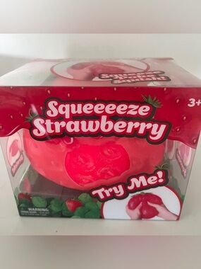 Strawberry squeeze squishy sunny days viral toy NEW and SEALED
